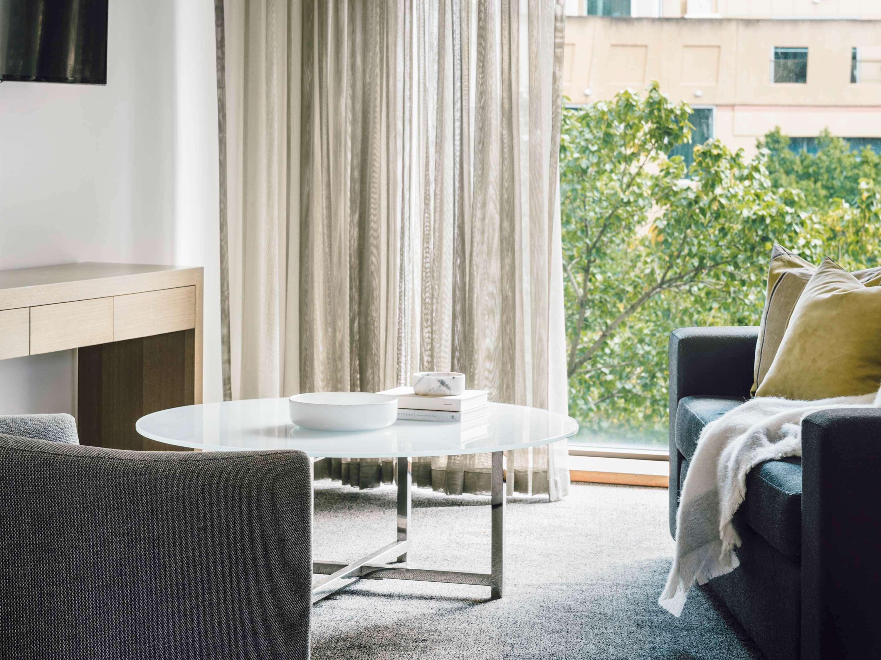 เดอะโคโม เมลเบิร์น - เอ็มแกลเลอรี Hotel ภายนอก รูปภาพ A living room at the hotel